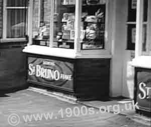Support wall below a shop window advertising St Bruno tobacco, 1940s