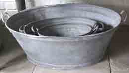 set of tin baths of different sizes